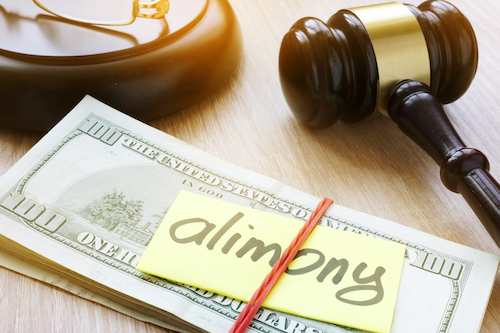 Alimony on a court desk. Divorce and separation concept