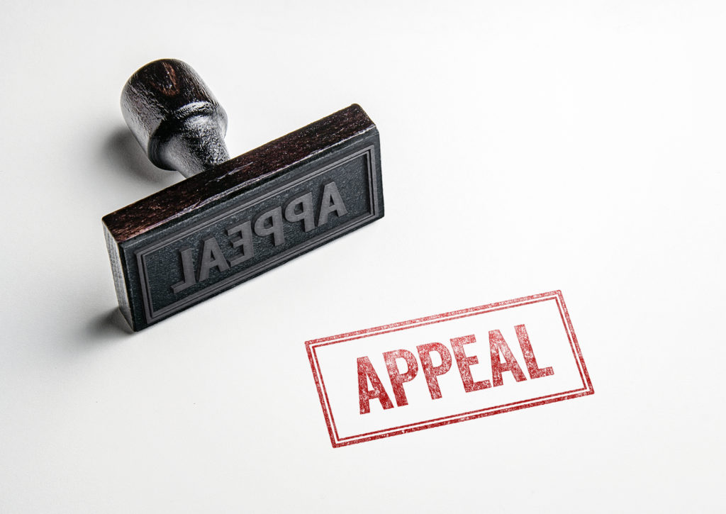 Rubber,Stamping,That,Says,'appeal'.