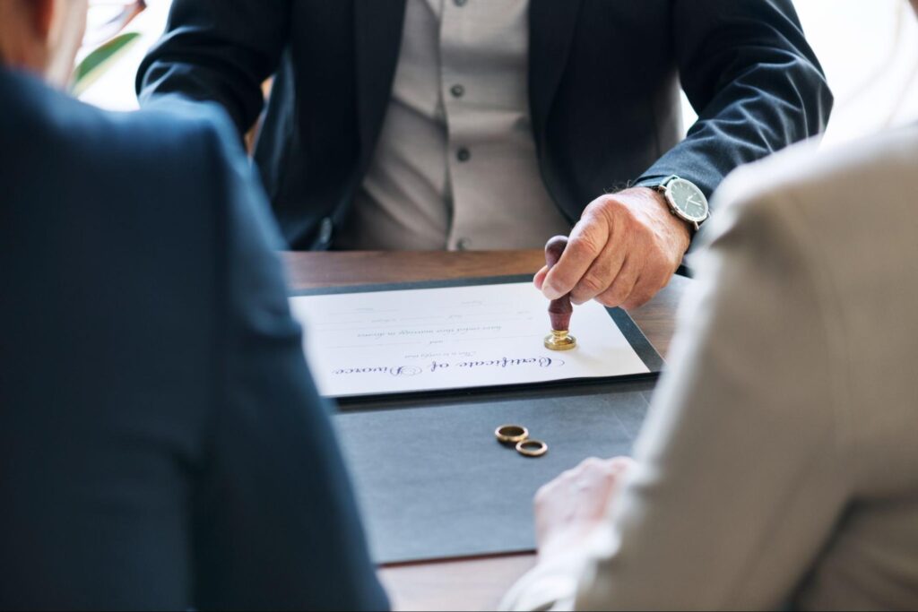 Lawyer stamping divorce paperwork